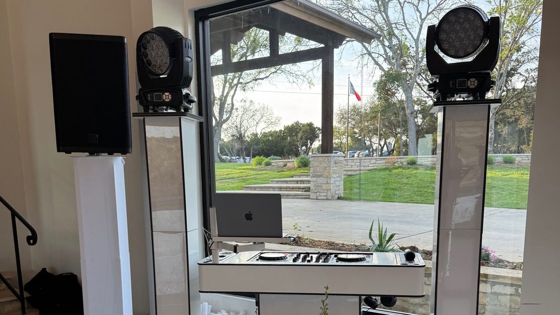 The DJ booth set up at a modern venue