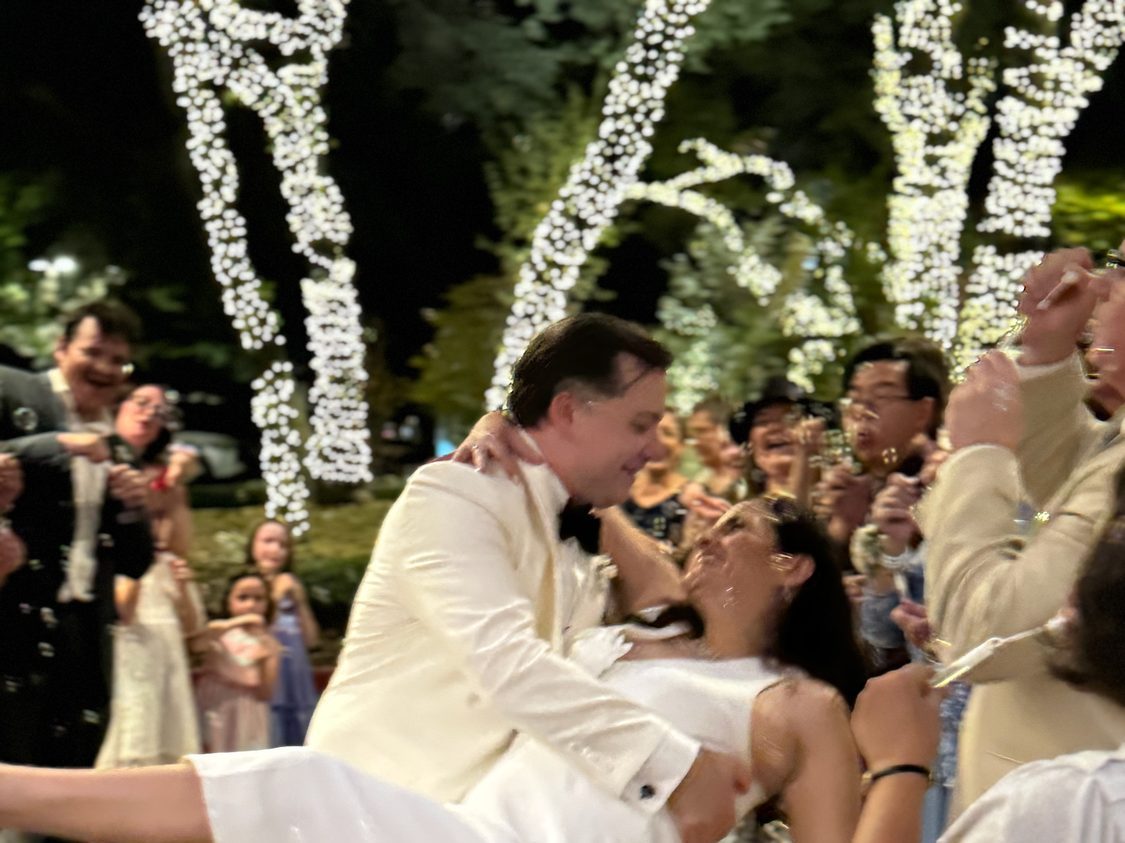 A first dance dip in front of the whole guest list