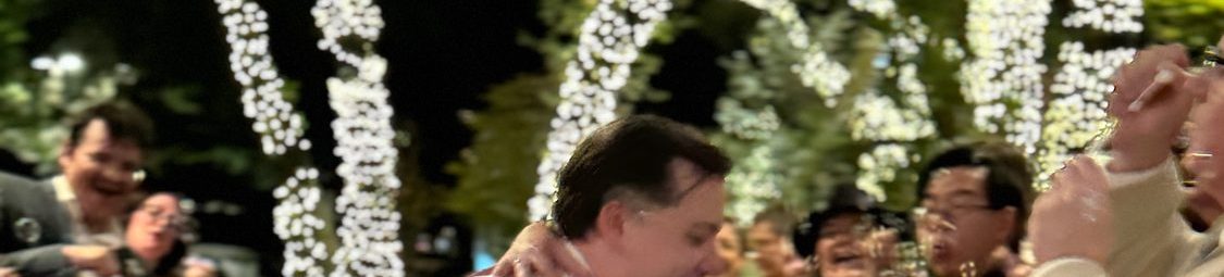 A first dance dip in front of the whole guest list