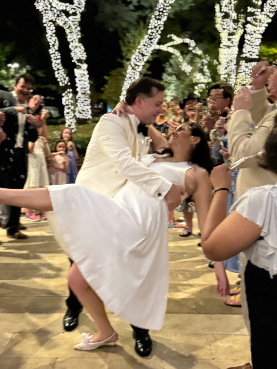 A first dance dip in front of the whole guest list